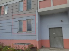 ГП16916472.Нежилое помещение.Фасад здания с выделенными окнами реализуемого объекта.jpg