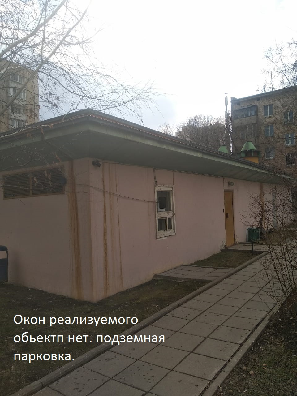 ГП16824607.Машино-место.Фасад здания с выделенными окнами реализуемого объекта.jpg