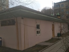 ГП16824607.Машино-место.Фасад здания с выделенными окнами реализуемого объекта.jpg