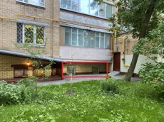 ГП16930921.Нежилое помещение.Фасад здания с выделенными окнами реализуемого объекта.jpg