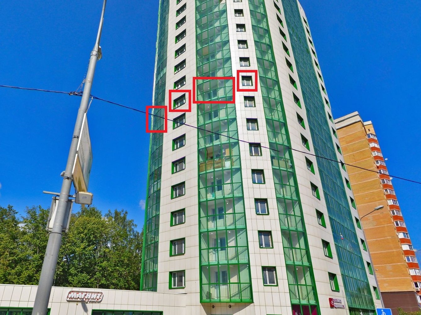 ГП16937850.Квартира.Фасад здания с выделенными окнами реализуемого объекта.jpg
