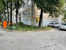 ГП16932274.Машино-место.Фасад здания с выделенными окнами реализуемого объекта.jpeg