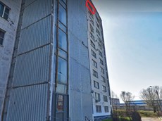 ГП16940465.Квартира.Фасад здания с выделенными окнами реализуемого объекта.jpg