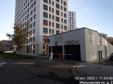 ГП16926669.Машино-место.Фасад здания с выделенными окнами реализуемого объекта.jpg