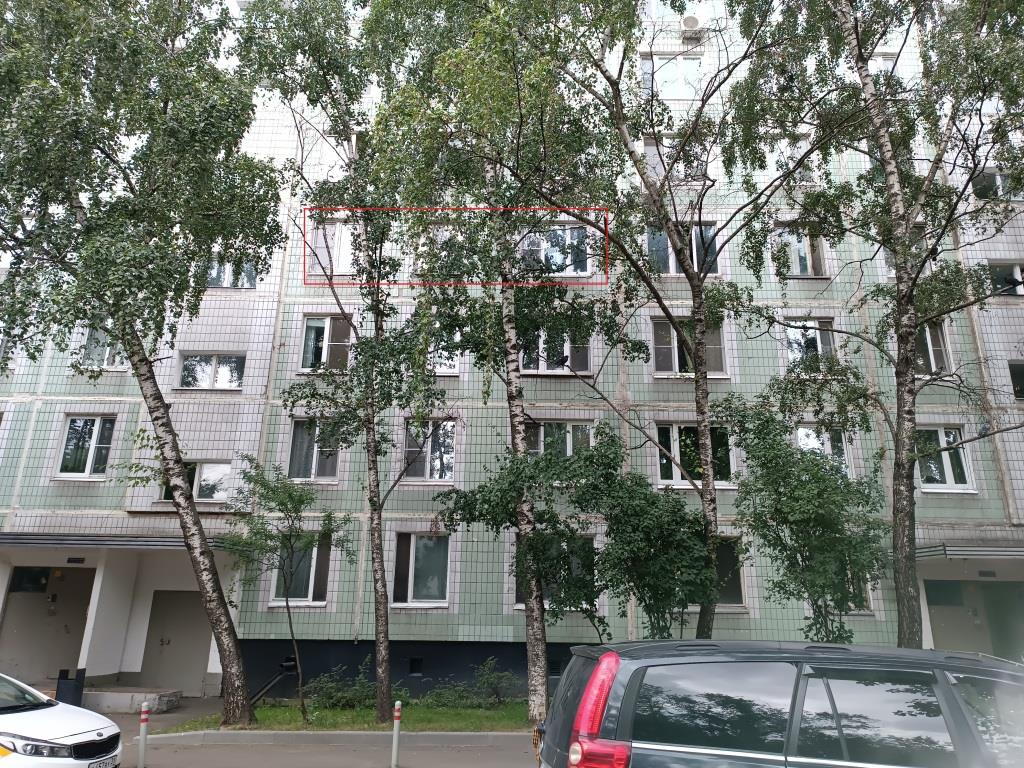 ГП16952783.Квартира.Фасад здания с выделенными окнами реализуемого объекта.jpg