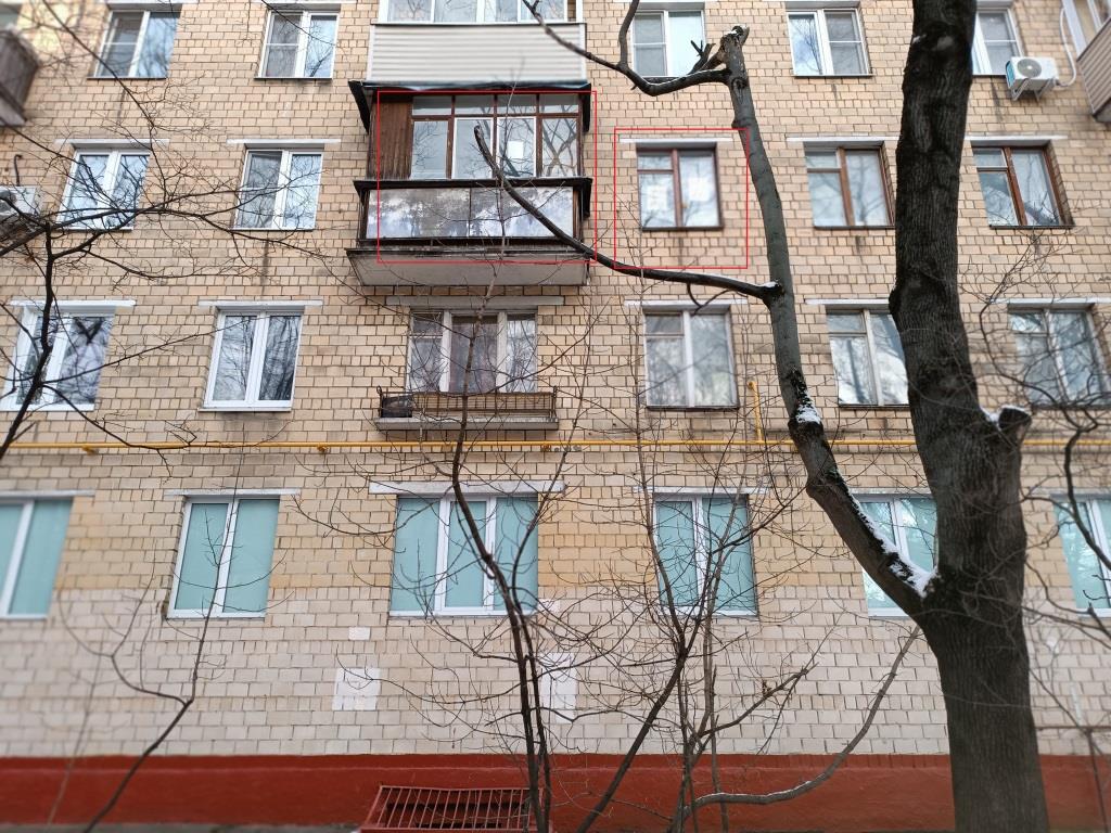 ГП16955518.Квартира.Фасад здания с выделенными окнами реализуемого объекта.jpg