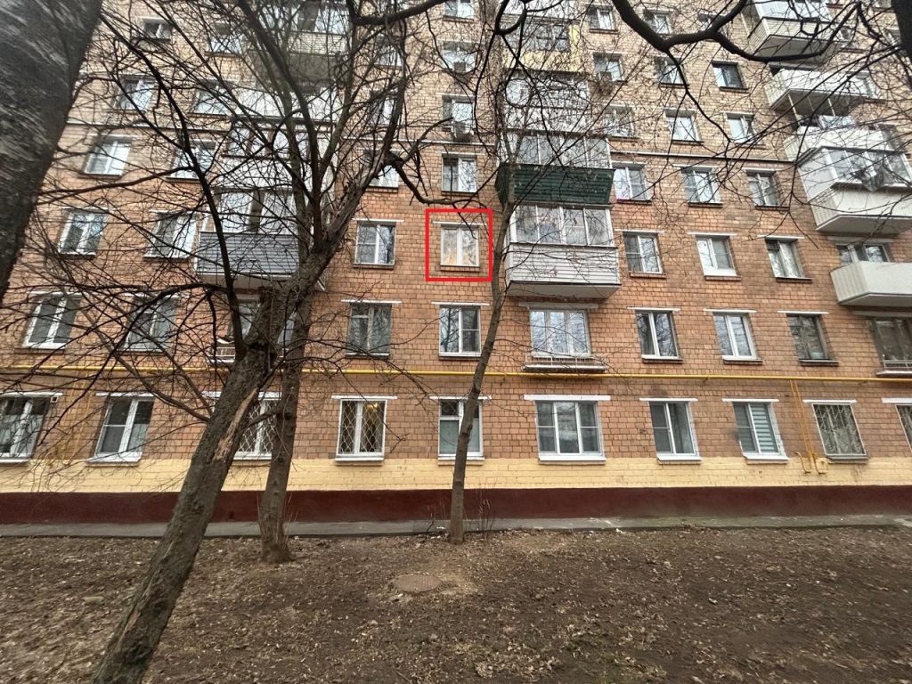 ГП16960274.Квартира.Фасад здания с выделенными окнами реализуемого объекта.jpg