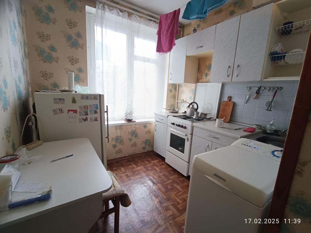 ГП16960470.Комната.Фасад здания с выделенными окнами реализуемого объекта_3.jpg