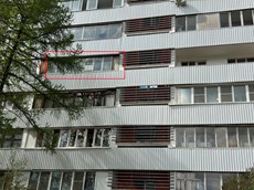 ГП16962335.Квартира.Фасад здания с выделенными окнами реализуемого объекта.jpg