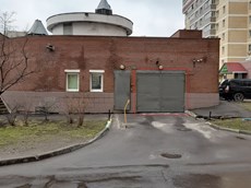 ГП16936278.Машино-место.Фасад здания с выделенными окнами реализуемого объекта.jpg