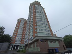 ГП16960912.Машино-место.Фасад здания с выделенными окнами реализуемого объекта.jpg