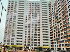 ГП16964285.Квартира.Фасад здания с выделенными окнами реализуемого объекта.jpg