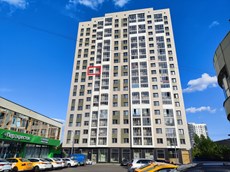 ГП16964488.Квартира.Фасад здания с выделенными окнами реализуемого объекта.jpg