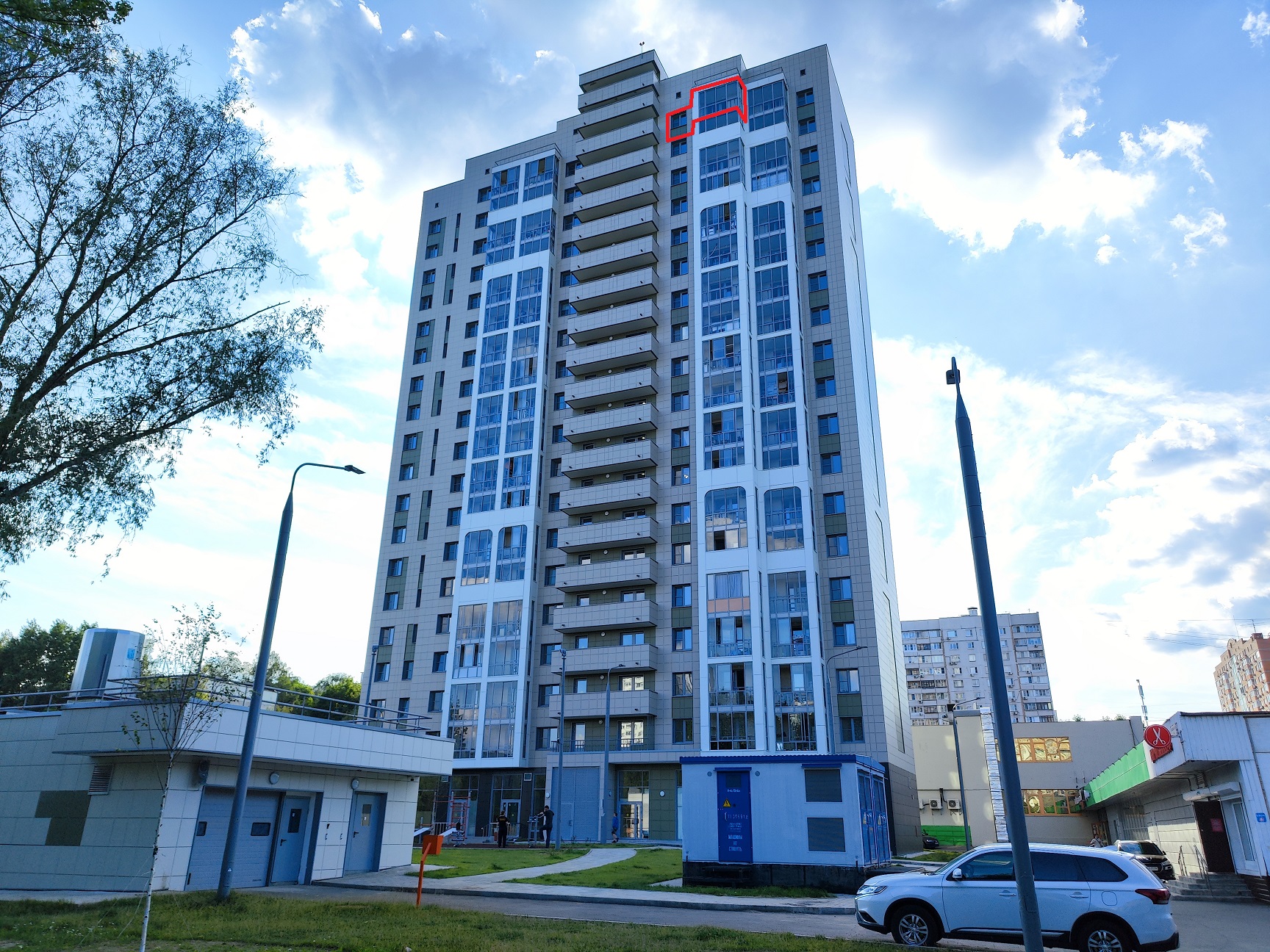 ГП16964490.Квартира.Фасад здания с выделенными окнами реализуемого объекта.jpg