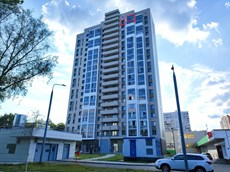 ГП16964490.Квартира.Фасад здания с выделенными окнами реализуемого объекта.jpg
