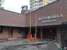 ГП16960334.Машино-место.Фасад здания с выделенными окнами реализуемого объекта.jpg
