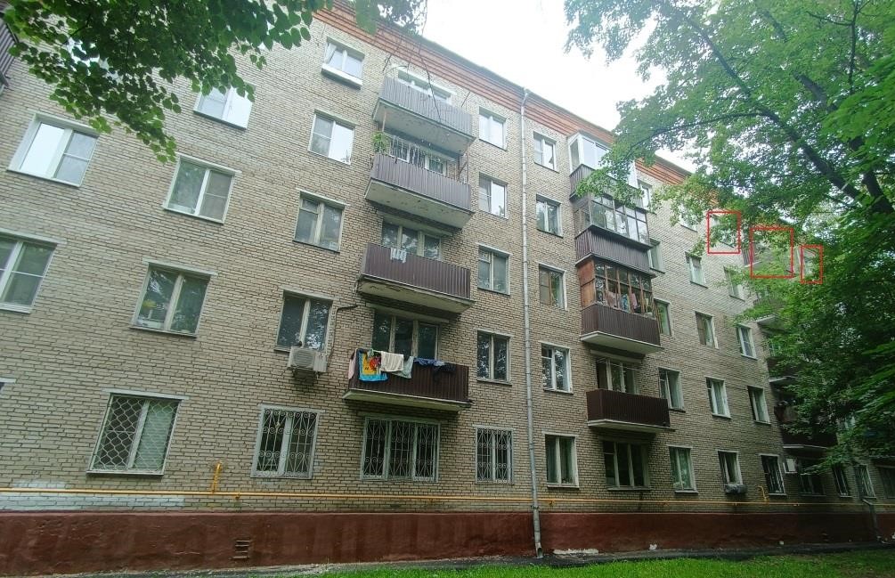 ГП16964231.Квартира.Фасад здания с выделенными окнами реализуемого объекта.jpg