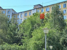 ГП16963834.Квартира.Фасад здания с выделенными окнами реализуемого объекта.jpg
