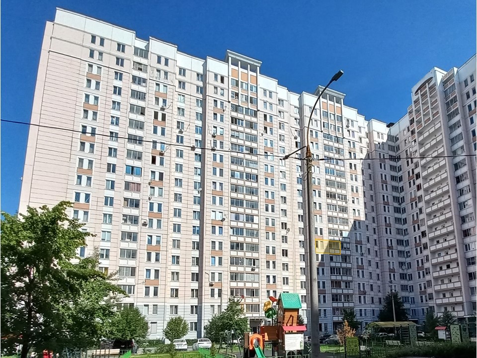 ГП16963858.Квартира.Фасад здания с выделенными окнами реализуемого объекта.jpg