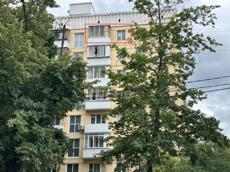 ГП16964166.Квартира.Фасад здания с выделенными окнами реализуемого объекта.jpg