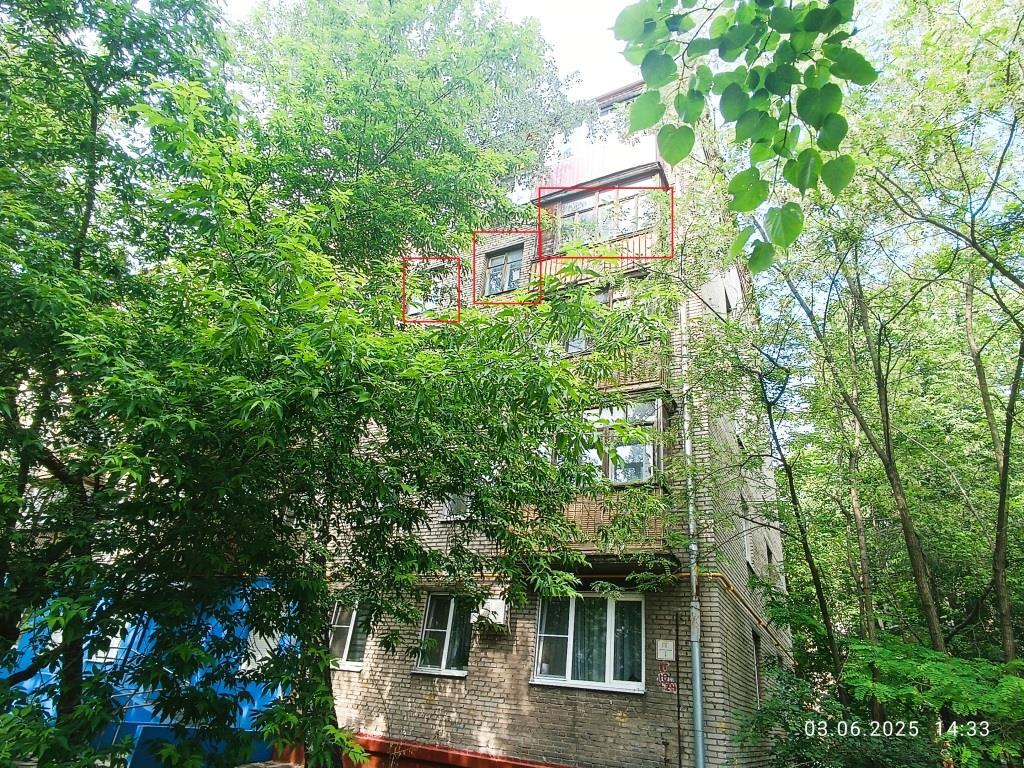 ГП16964112.Квартира.Фасад здания с выделенными окнами реализуемого объекта_2.jpg