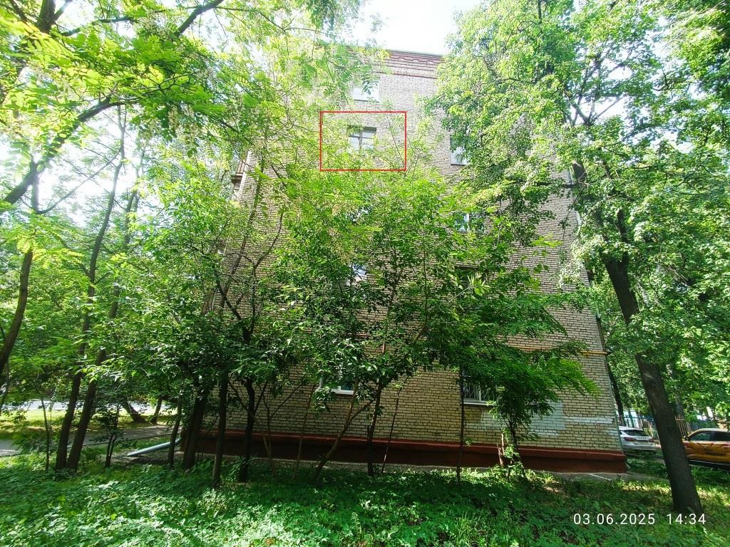 ГП16964112.Квартира.Фасад здания с выделенными окнами реализуемого объекта.jpg