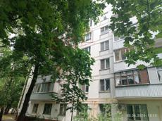 ГП16964110.Квартира.Фасад здания с выделенными окнами реализуемого объекта.jpg