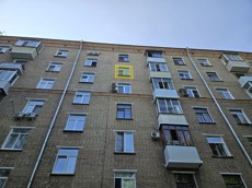 ГП16963957.Квартира.Фасад здания с выделенными окнами реализуемого объекта.jpg