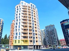 ГП16963785.Квартира.Фасад здания с выделенными окнами реализуемого объекта.jpg