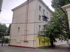 ГП16964607.Квартира.Фасад здания с выделенными окнами реализуемого объекта.jpg