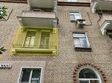 ГП16965594.Квартира.Фасад здания с выделенными окнами реализуемого объекта.jpg