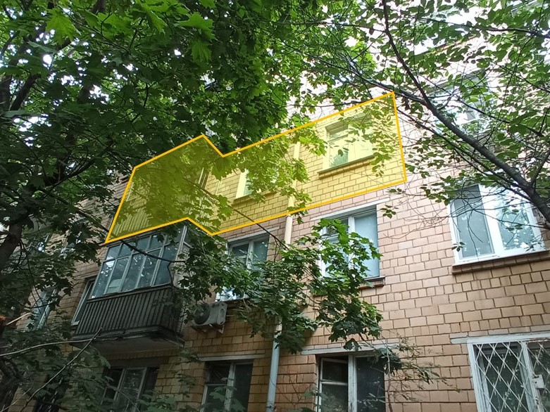 ГП16964018.Квартира.Фасад здания с выделенными окнами реализуемого объекта.jpg