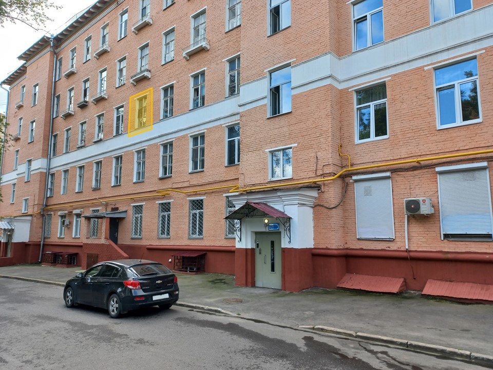 ГП16965770.Квартира.Фасад здания с выделенными окнами реализуемого объекта.jpg