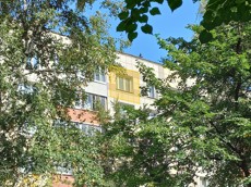 ГП16966957.Квартира.Фасад здания с выделенными окнами реализуемого объекта.jpg