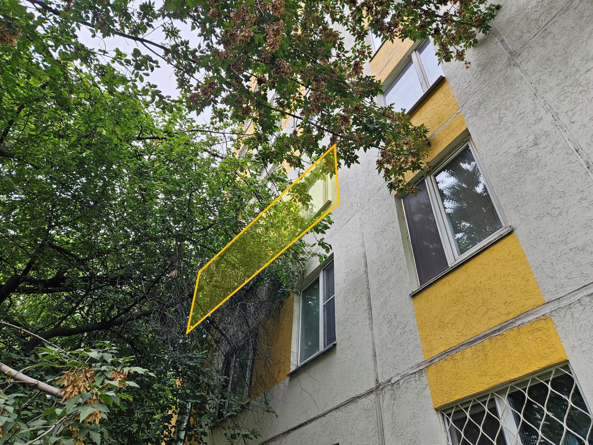 ГП16966705.Квартира.Фасад здания с выделенными окнами реализуемого объекта.jpg