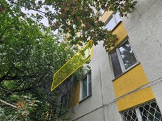 ГП16966705.Квартира.Фасад здания с выделенными окнами реализуемого объекта.jpg