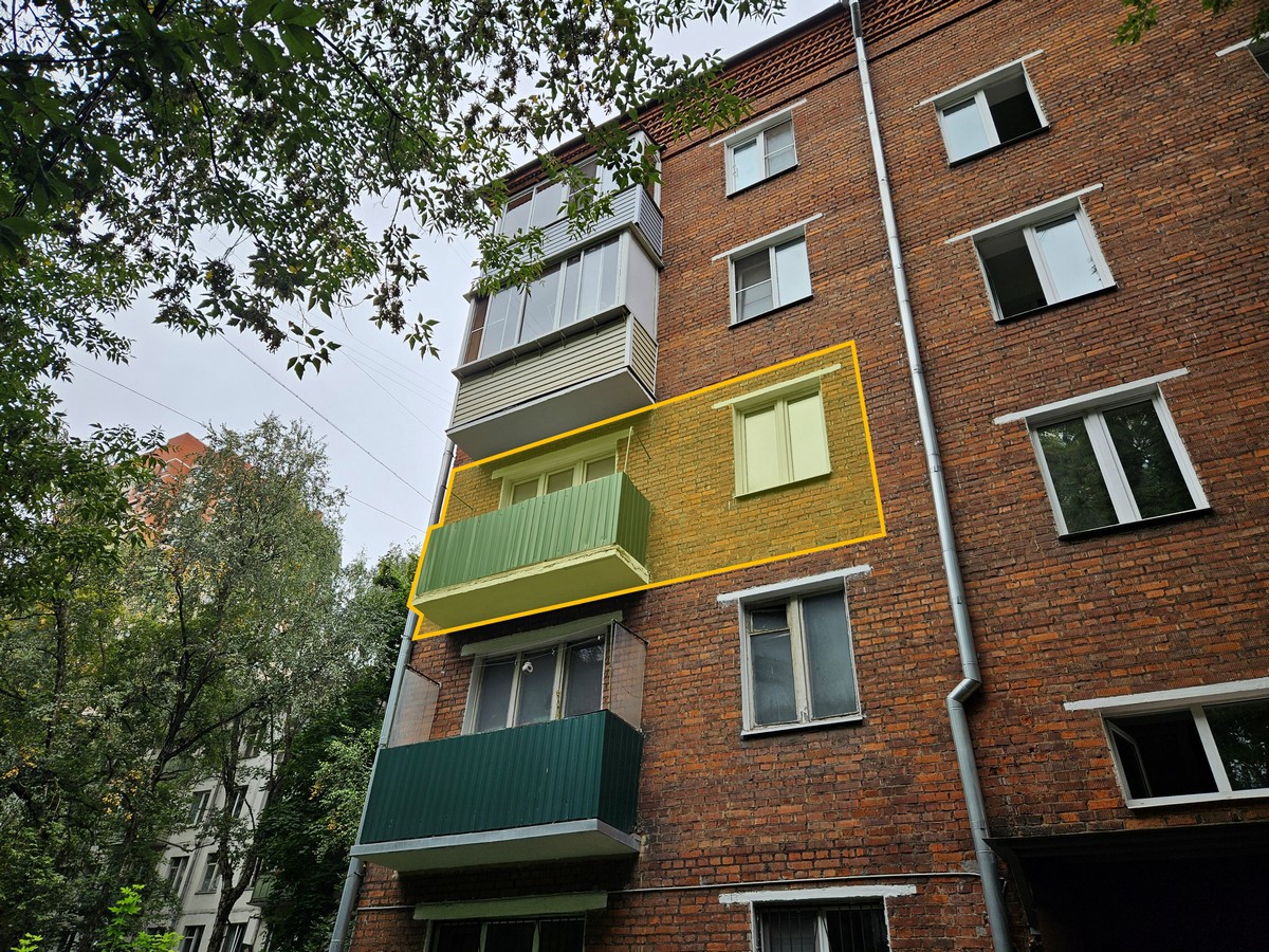 ГП16967157.Квартира.Фасад здания с выделенными окнами реализуемого объекта.jpg