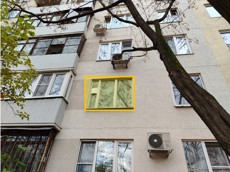 ГП16974015.Квартира.Фасад здания с выделенными окнами реализуемого объекта.jpg