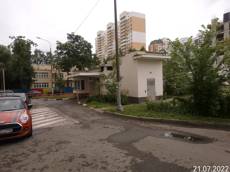 ГП16878111.Машино-место.Фасад здания с выделенными окнами реализуемого объекта.jpg