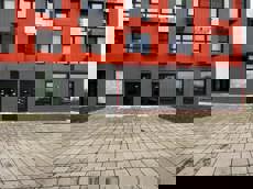 ГП16972560.Нежилое помещение.Фасад здания с выделенными окнами реализуемого объекта.jpg