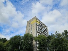 ГП16965418.Квартира.Фасад здания с выделенными окнами реализуемого объекта.jpg