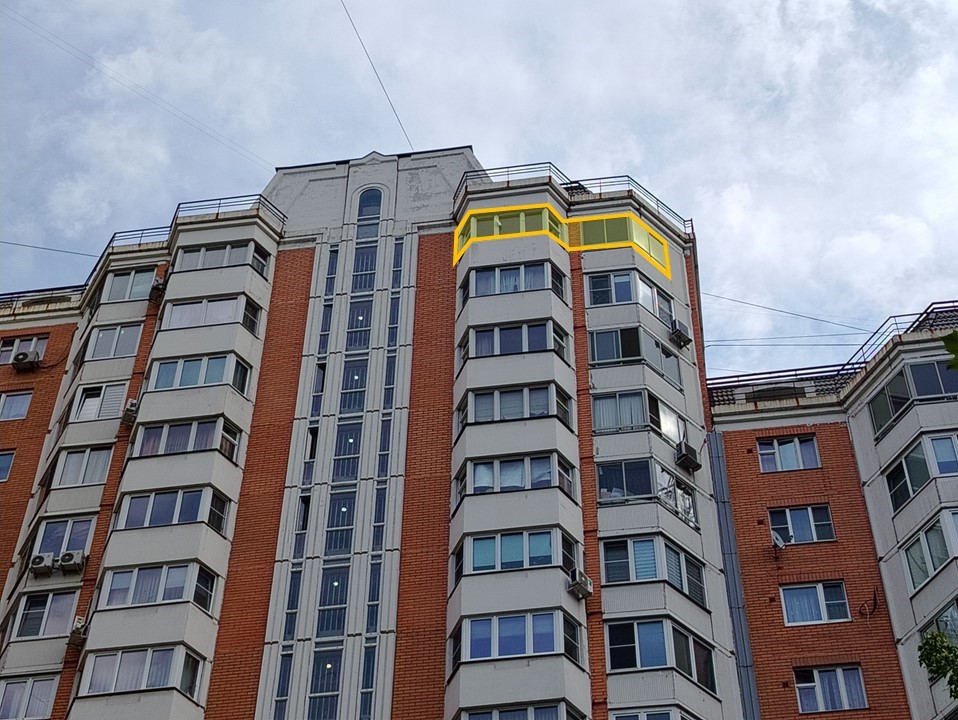 ГП16995643.Квартира.Фасад здания с выделенными окнами реализуемого объекта.jpg